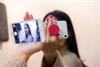 Mobilholder Stickn Hold med trykk av logo selfie