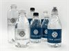 Snasavann-flasker-med-norsk-kildevann-og-egen-etiektt